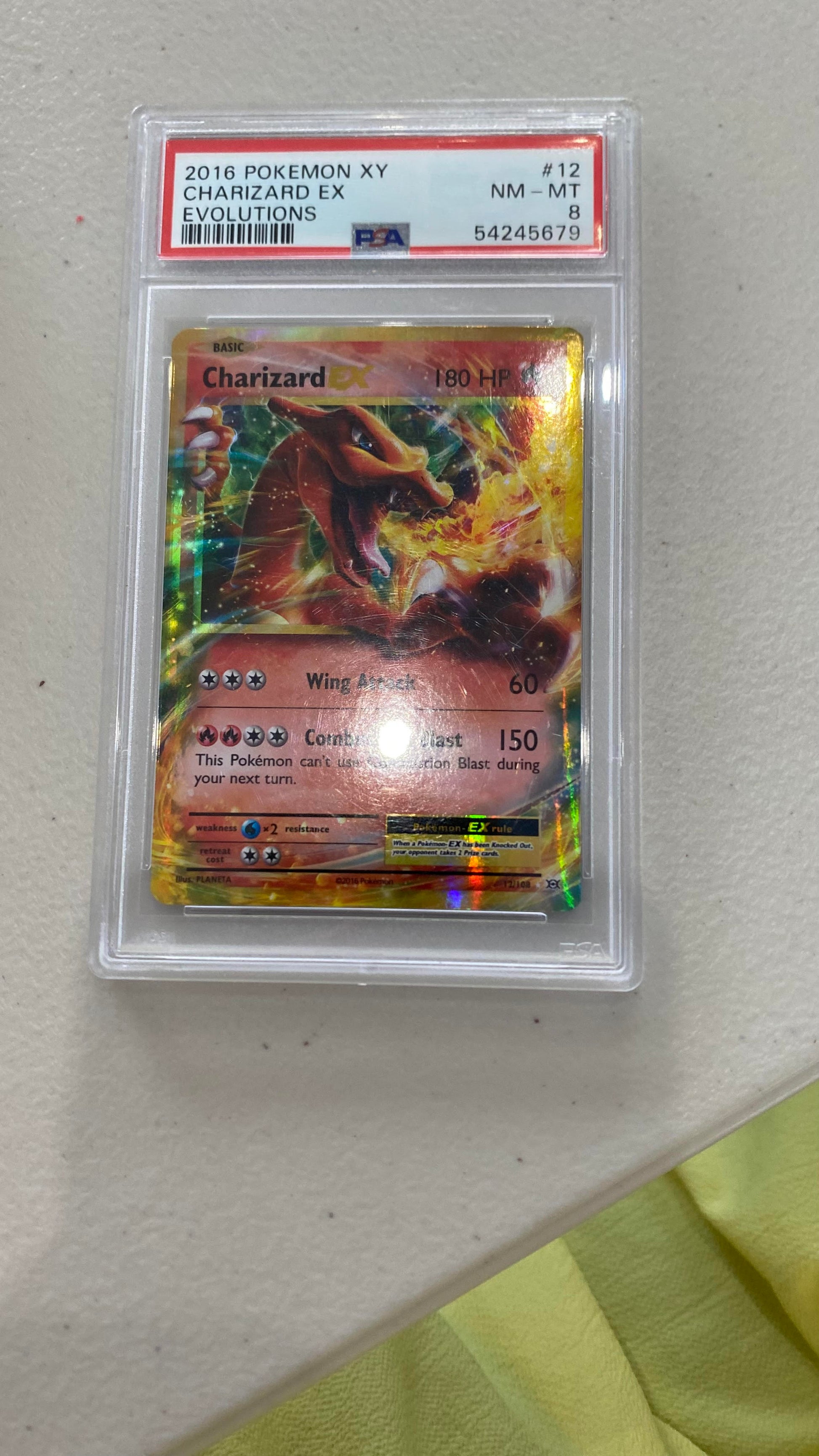 * PSA: Grade 8 - Charizard ex - XY Evolutions - 12/108