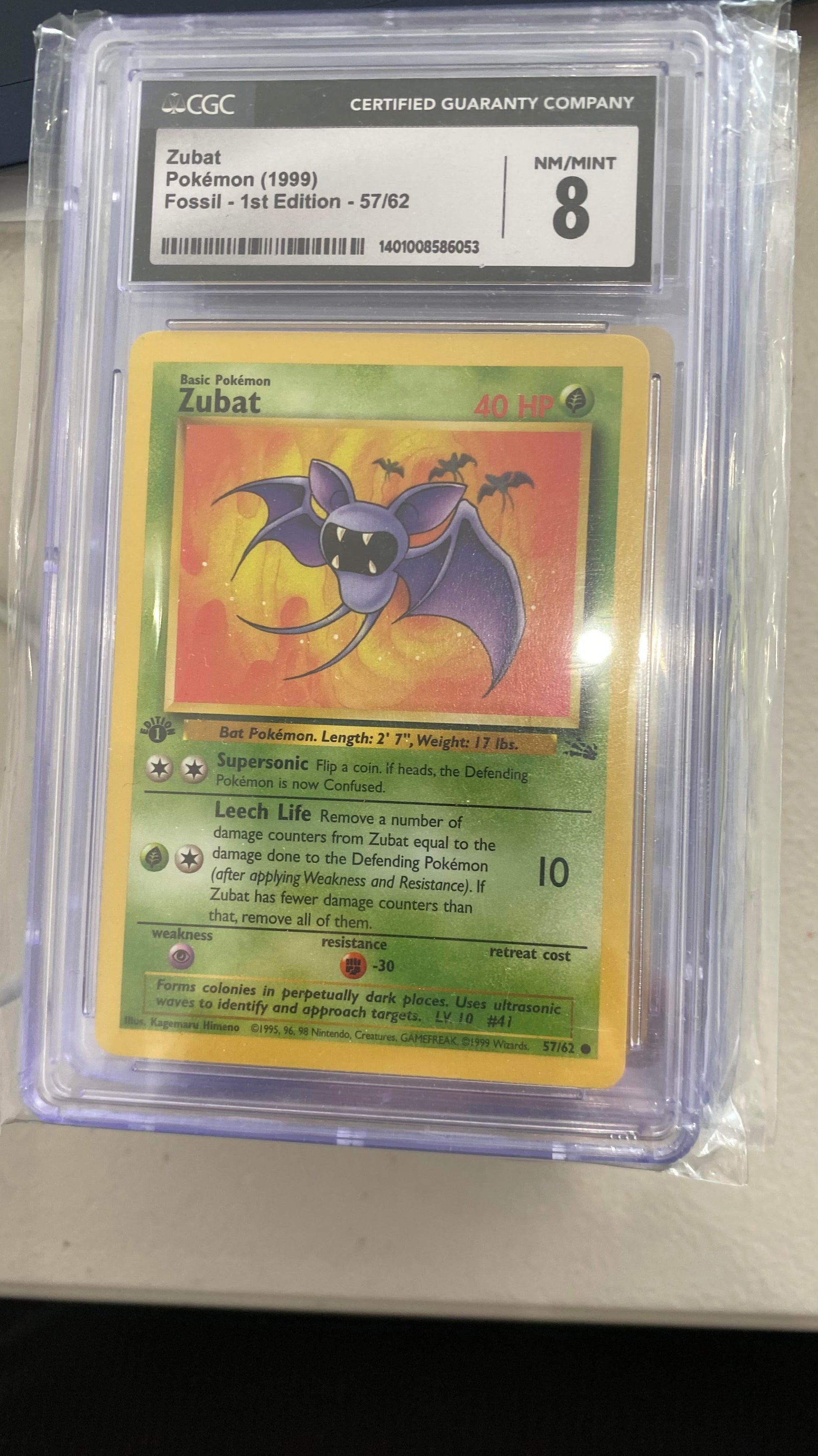 CGC: Grade 8 - 1999 1st Edition Zubat - 57/62 - Fossil